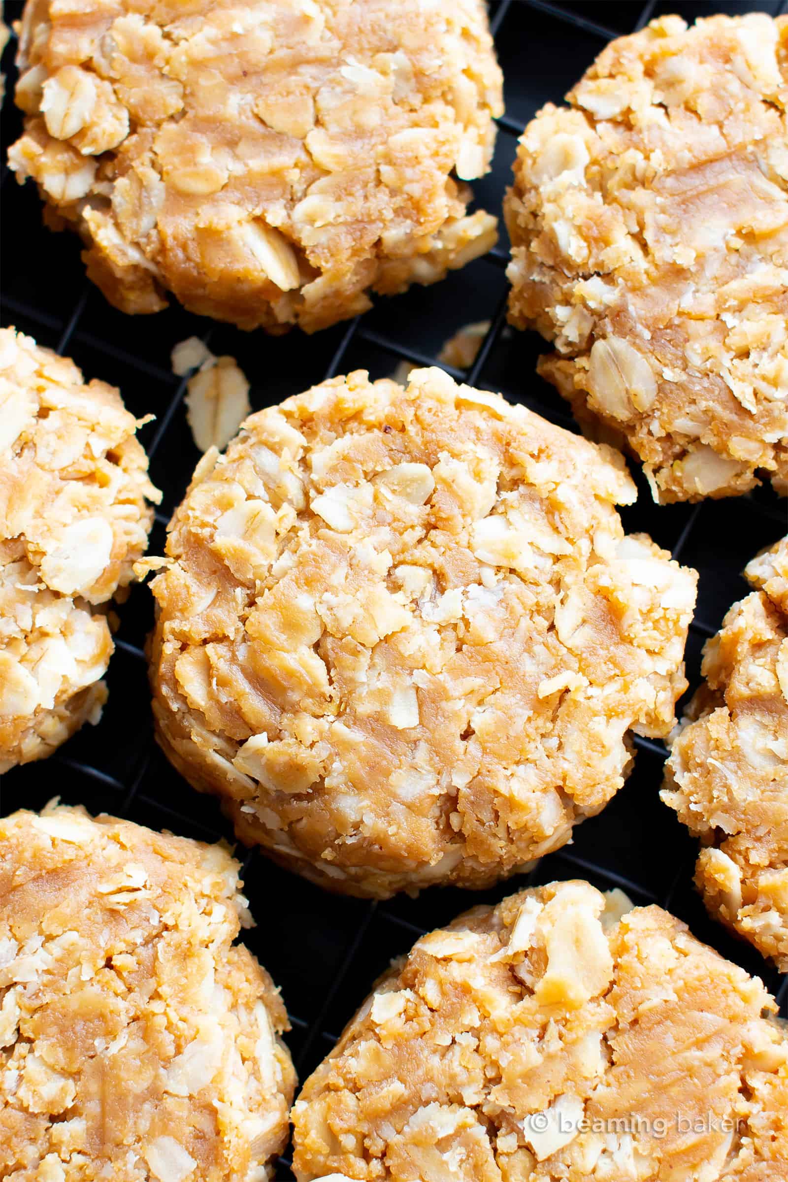 Overhead view of vegan no bake cookies on a black background