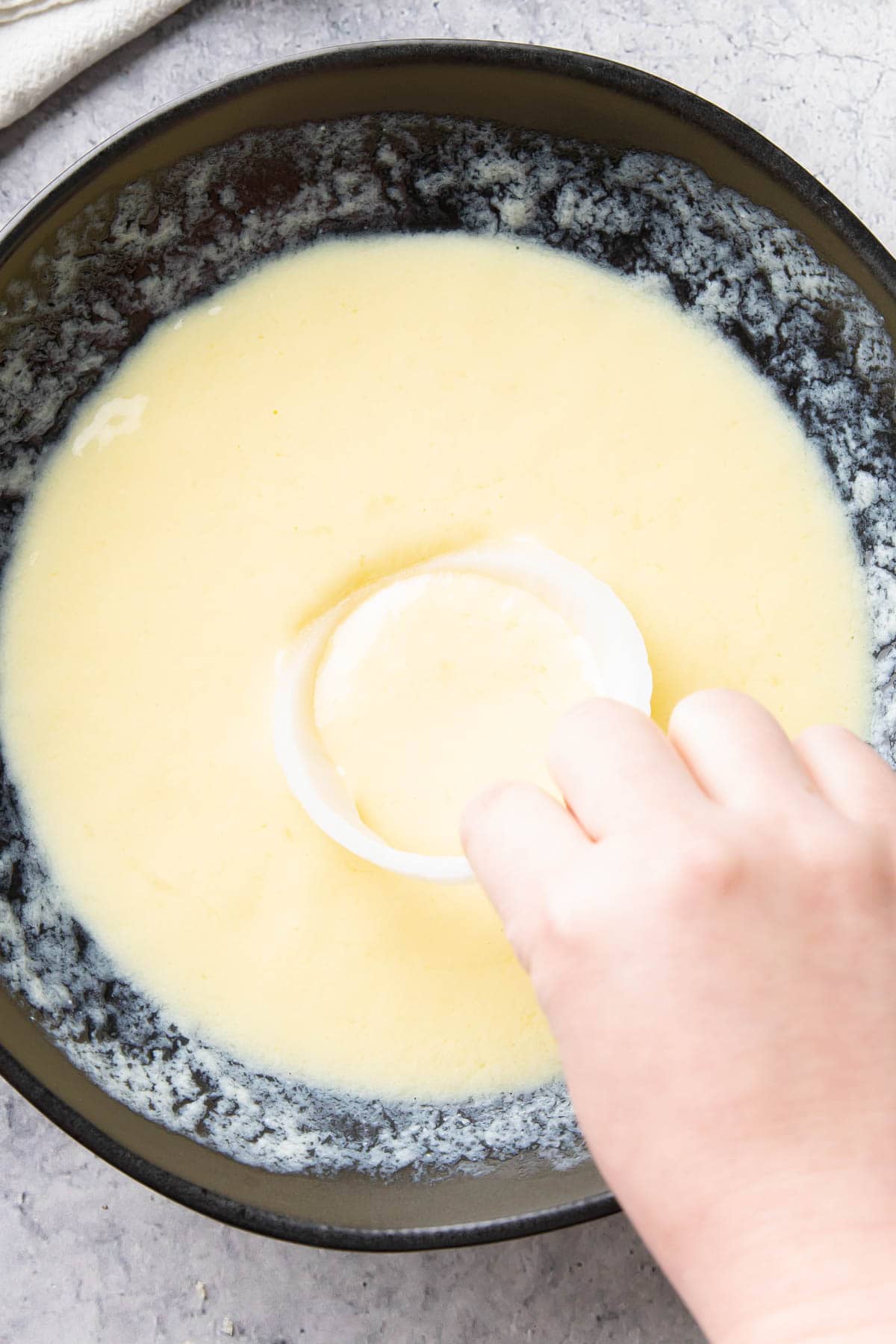 dredging again in egg batter for an extra thick and crispy outer shell