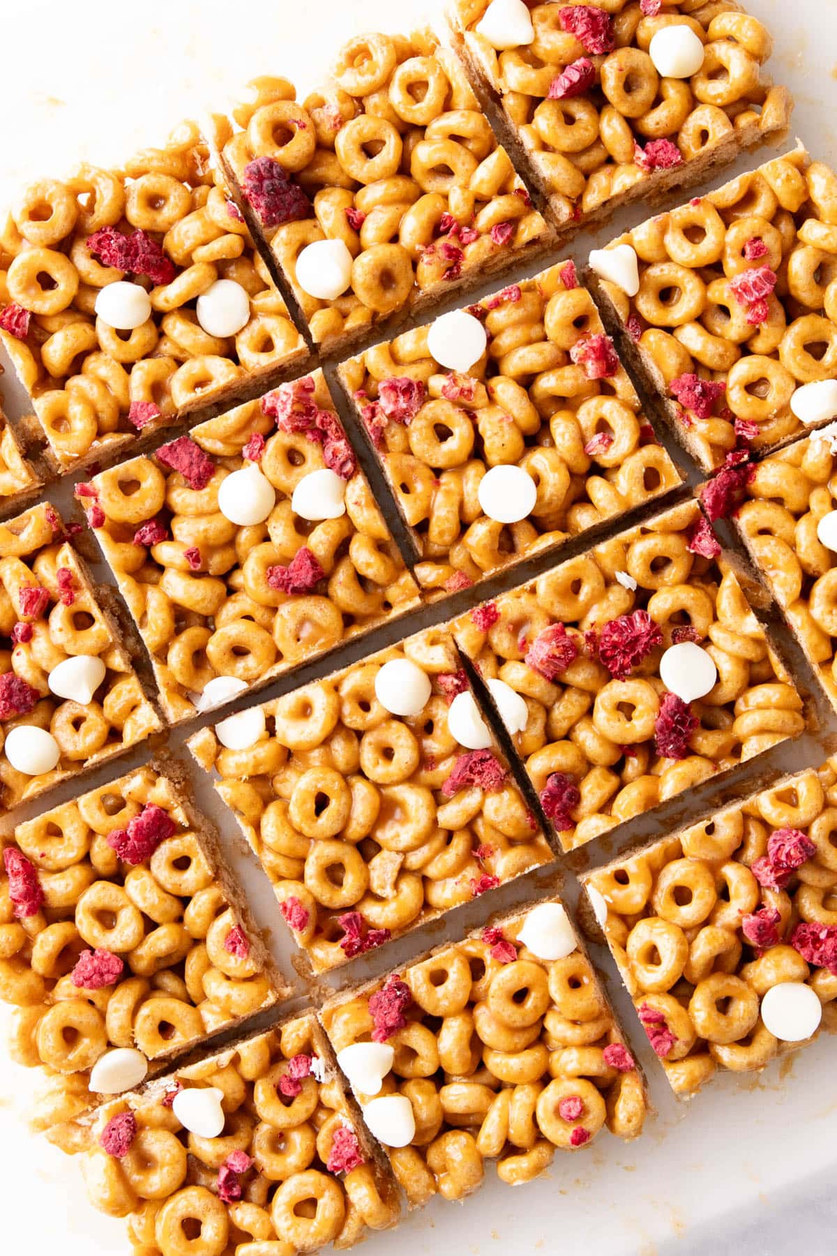 Breakfast bars stuffed with cheerios, fruit, and toppings