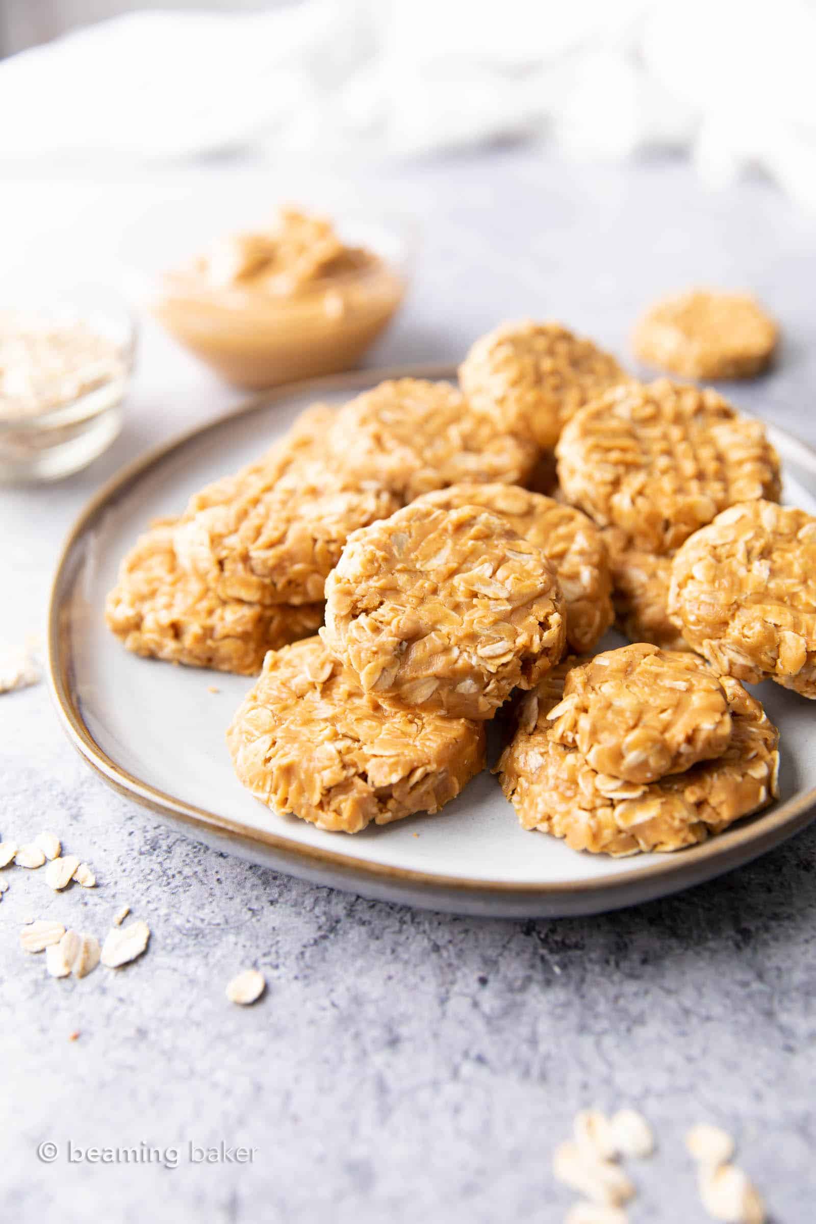 Plate of no bake peanut butter cookies on a gray table.