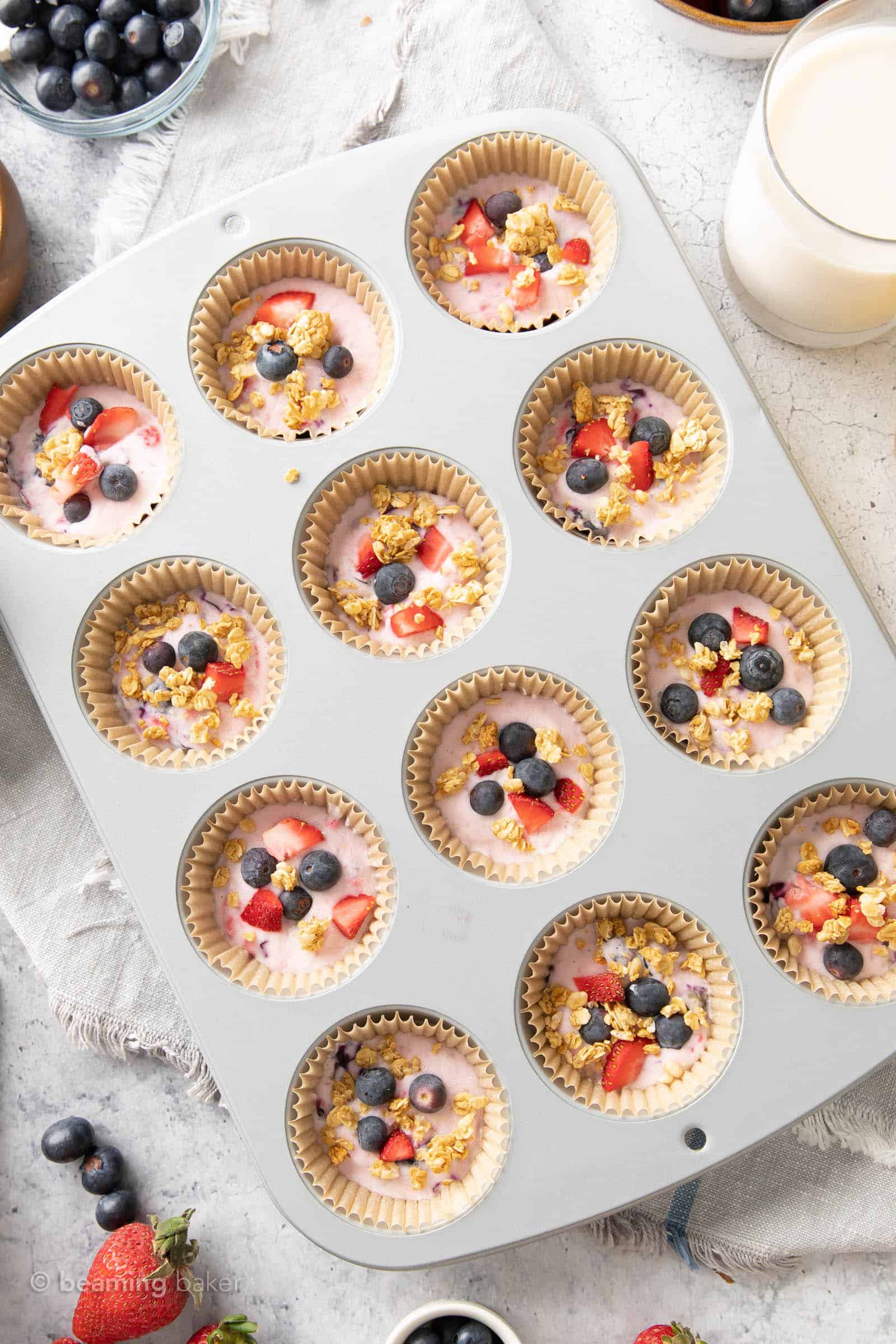 focus on muffin pan - 12 cup pan demonstratng how to make these fruit-filled snacks