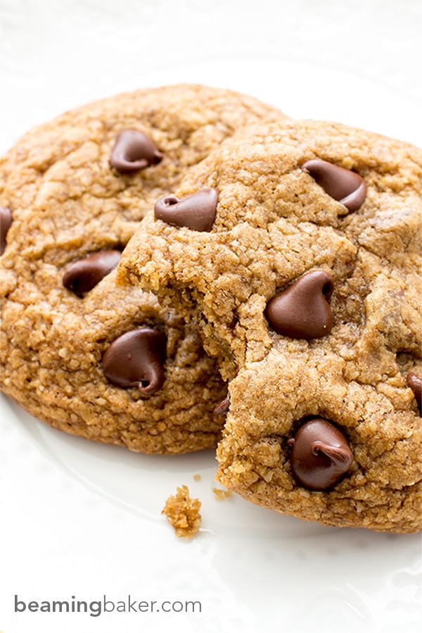 Soft, chewy, gooey Healthier Vegan Chocolate Chip Cookies. Made with oat flour, whole wheat flour, coconut sugar and coconut oil. BEAMINGBAKER.COM