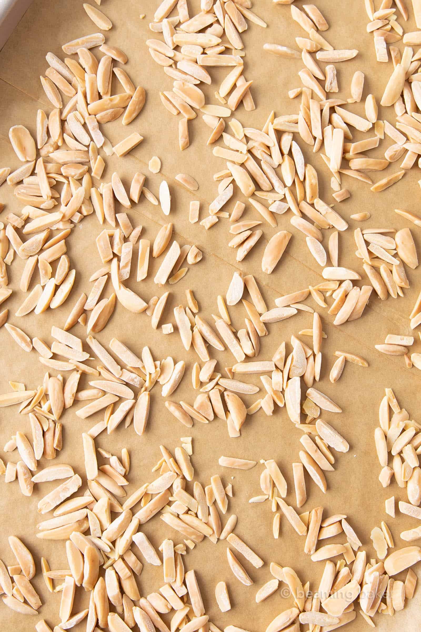 toasted slivered almonds from the oven on a baking sheet