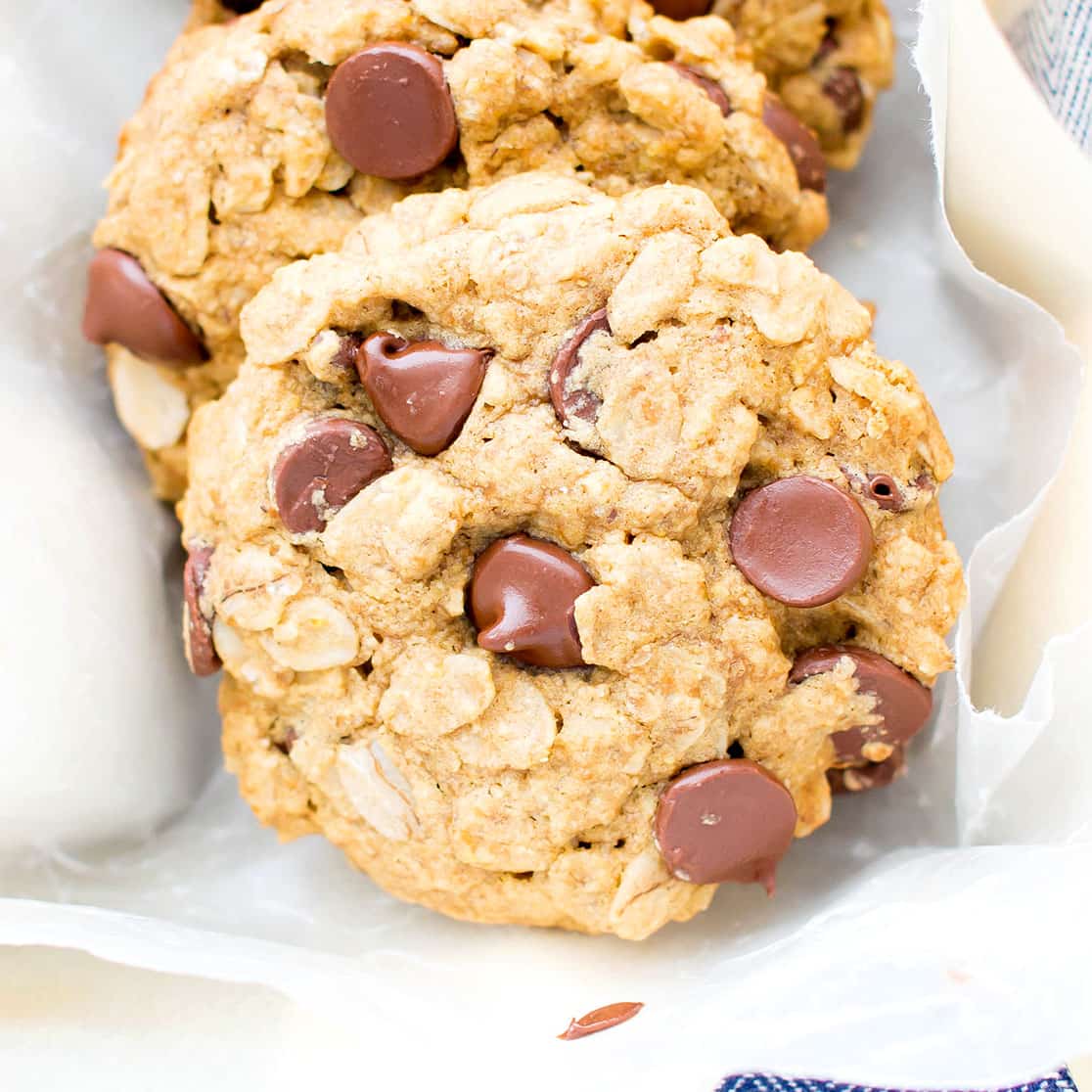 Gluten Free Vegan Oatmeal Chocolate Chip Cookies (V, GF, Dairy-Free): an easy recipe for soft, chewy oatmeal cookies bursting with chocolate chips and oats! #Vegan #GlutenFree #OatFlour #DairyFree | BeamingBaker.com