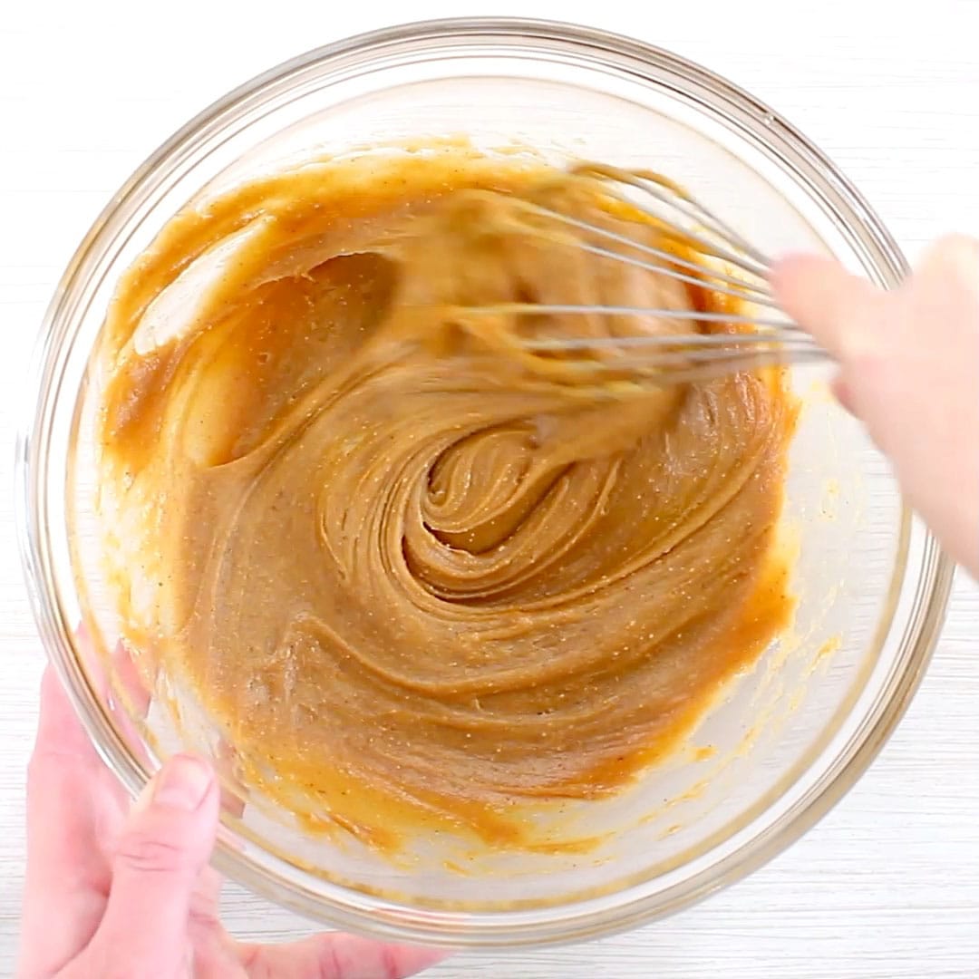 whisking sweetened no bake chocolate oatmeal cookies mixture until smooth after heating