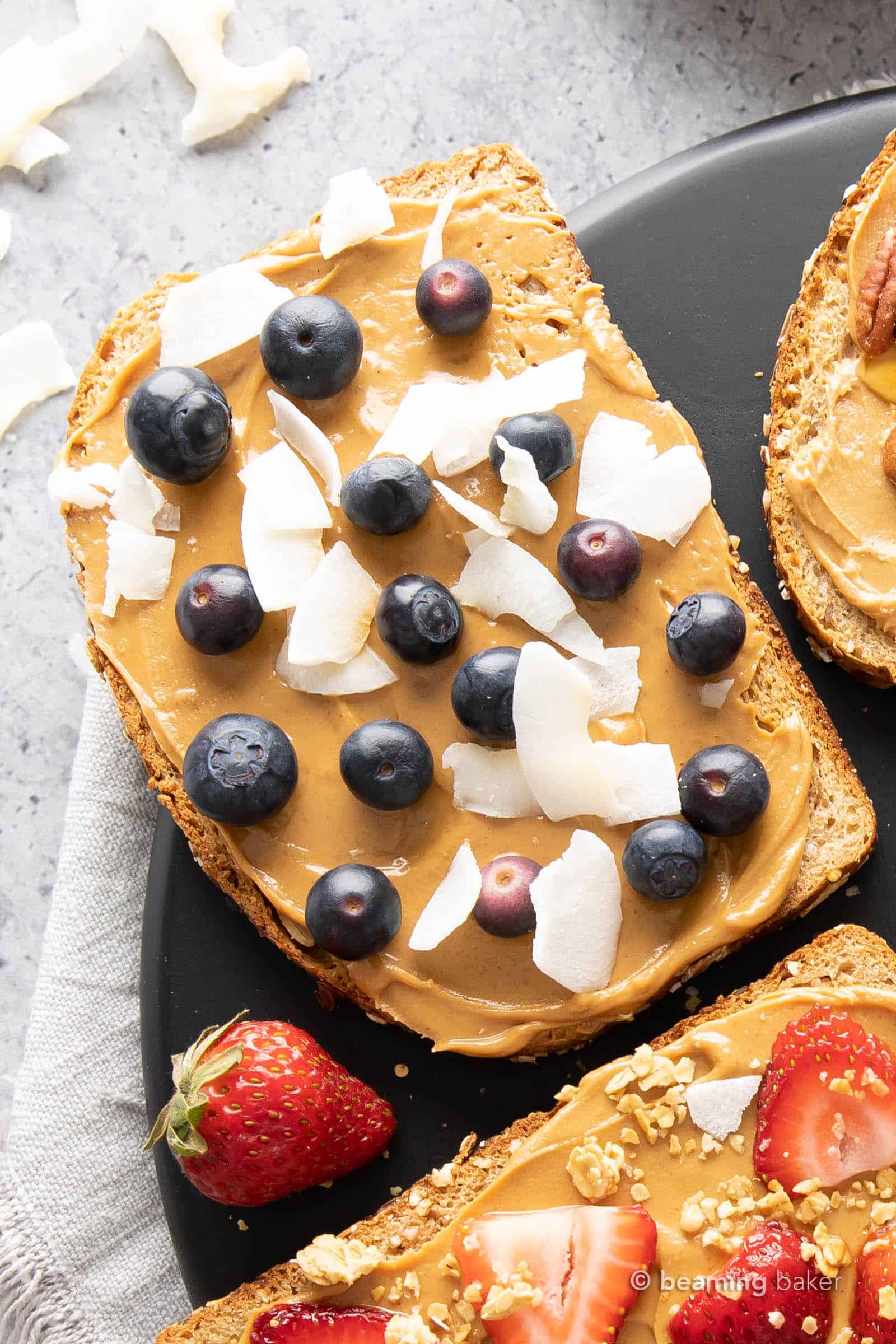 Blueberry coconut peanut butter toast with fresh blueberries and coconut chips