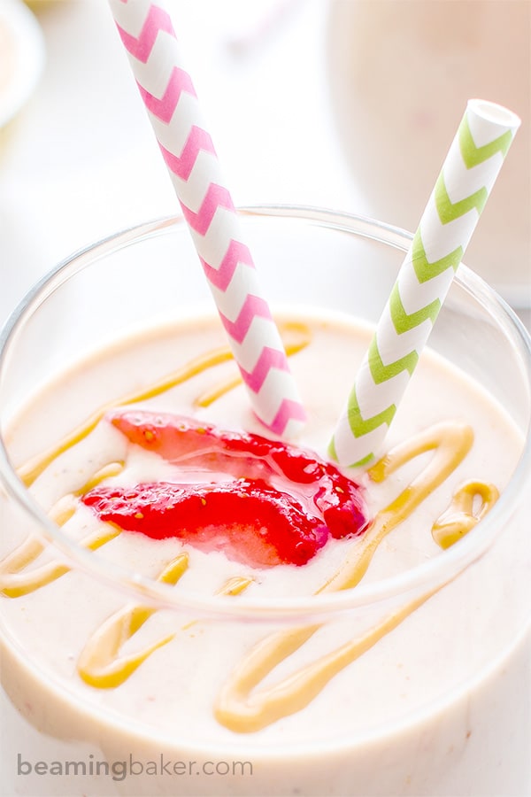 Protein-Packed Strawberry Peanut Butter Smoothie: Just 5 simple ingredients in a quick and easy recipe for a creamy, healthy and protein-rich smoothie chockfull of strawberries and peanut butter. BEAMINGBAKER.COM #healthy #5ingredients