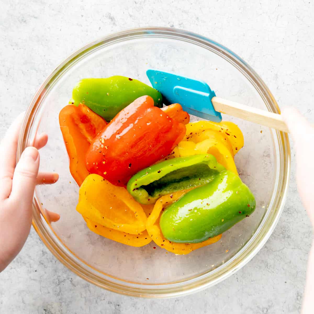 Showing How to make this recipe – stirring with a spatula to coat