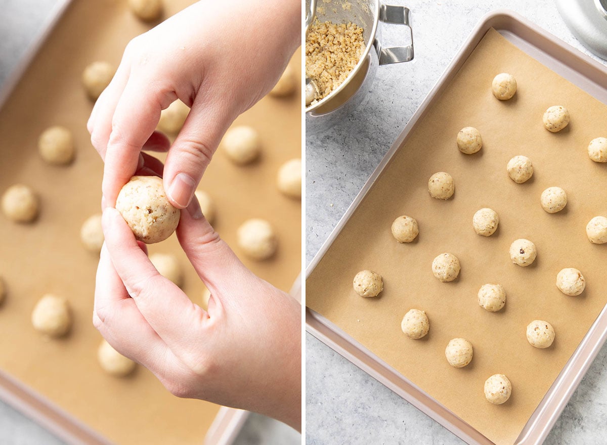 Someone pressing this buttery pecan snowball cookies recipe's cookie dough balls into spheres and spacing evenly apart on the baking sheet