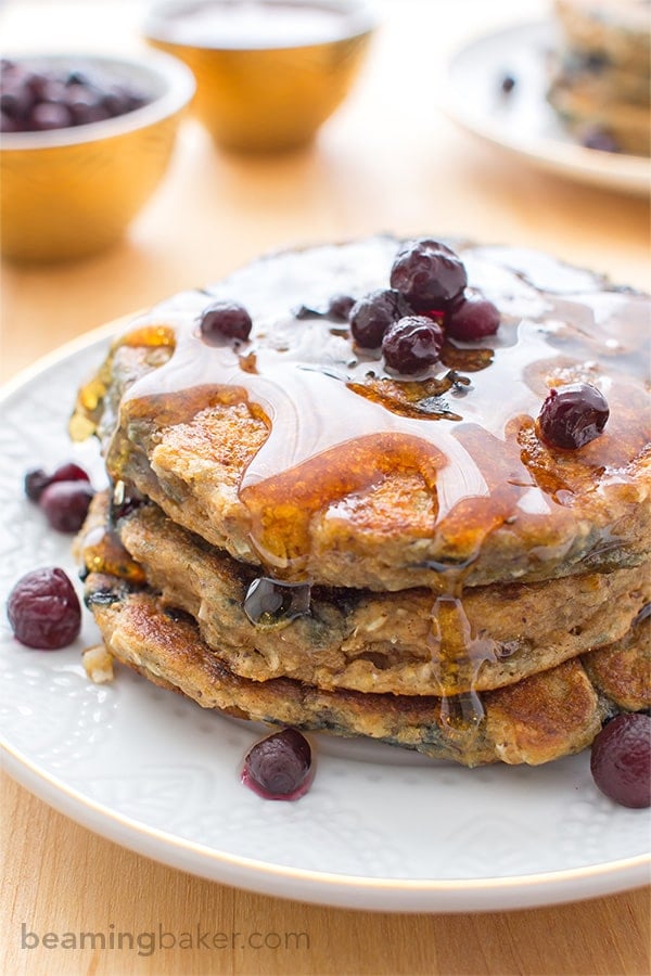 Vegan Blueberry Pancakes: An easy recipe for fluffy, moist blueberry pancakes that are perfect for a cozy breakfast or brunch. BEAMINGBAKER.COM #Vegan #OneBowl
